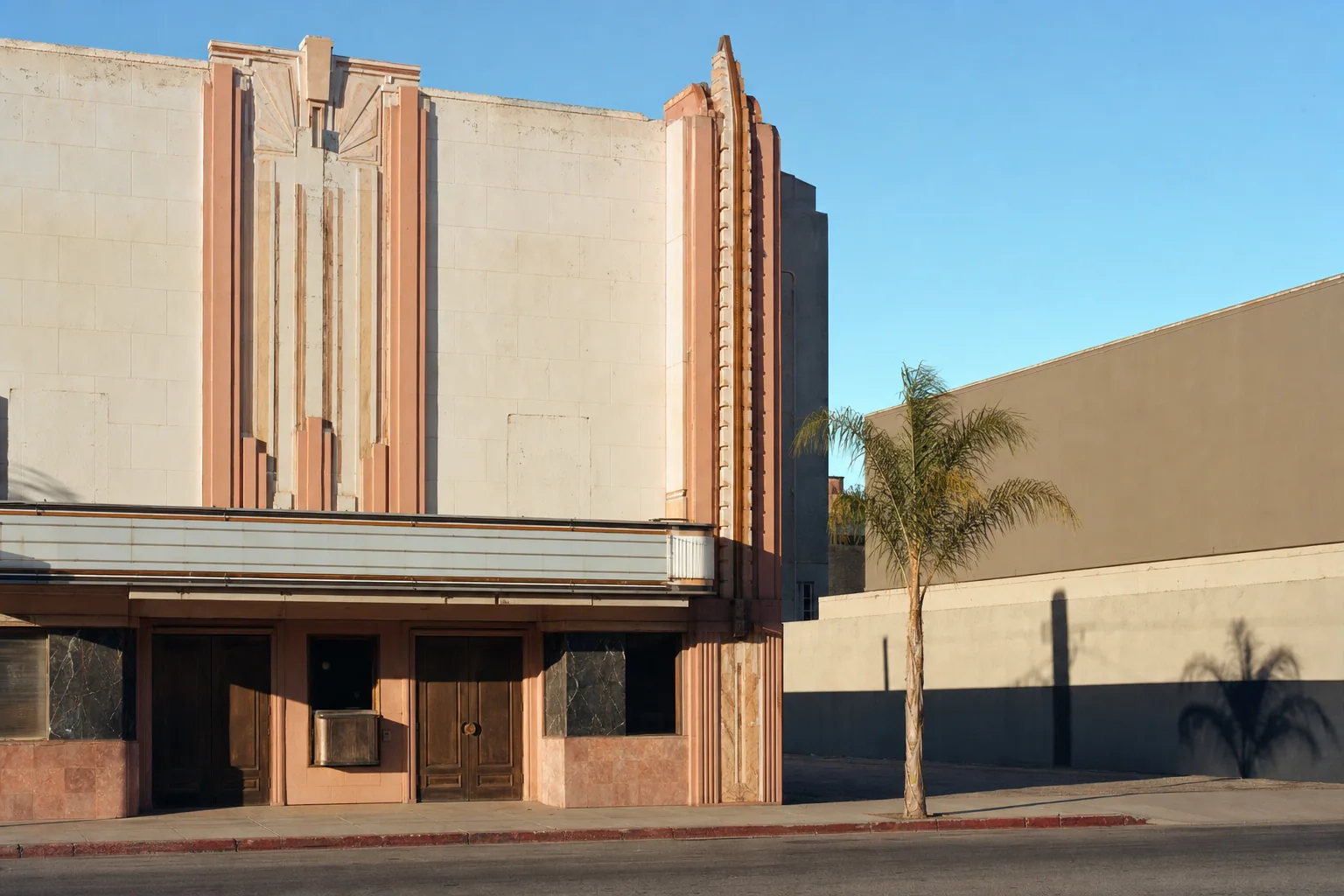 Weathered Art Deco theater facade without signage